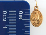 MEFS2243 - 19.2k Portug.Gold Oval "Our Lady of Fátima" Medal - 11x8mm - Columbia Jewelers, Fall River, Massachusetts, USA
